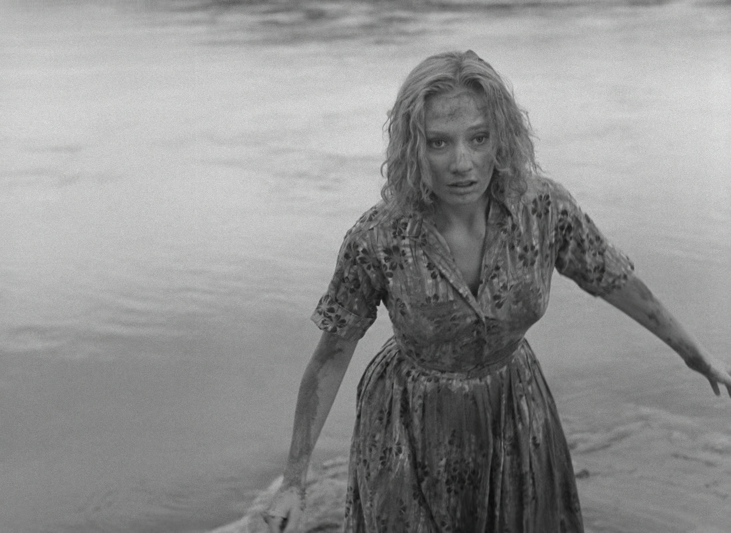 A woman by the water in Carnival of Souls